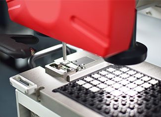 Pick and place waffle tray loader
