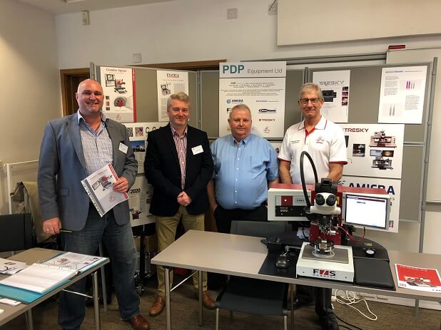 xyztec's Bob Sykes and Volker Loibl-Kähler at IMAPS UK with distributor PDP